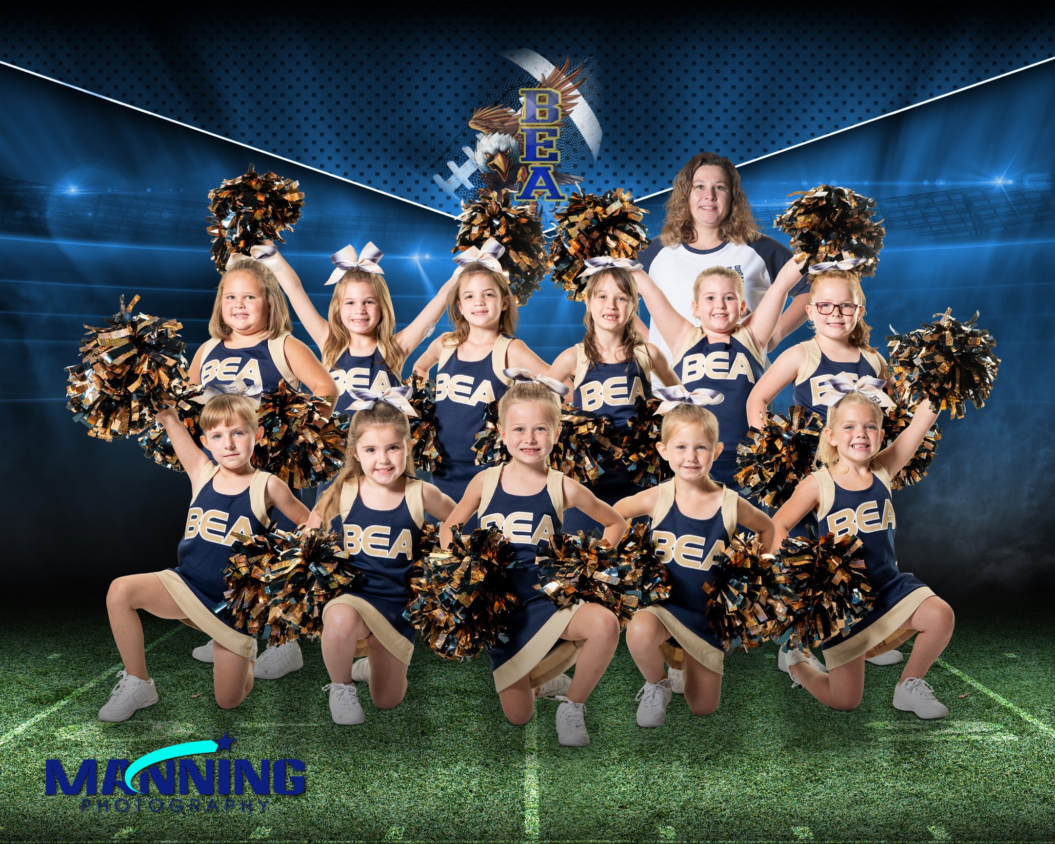 Cheerleading team posing with pom-poms