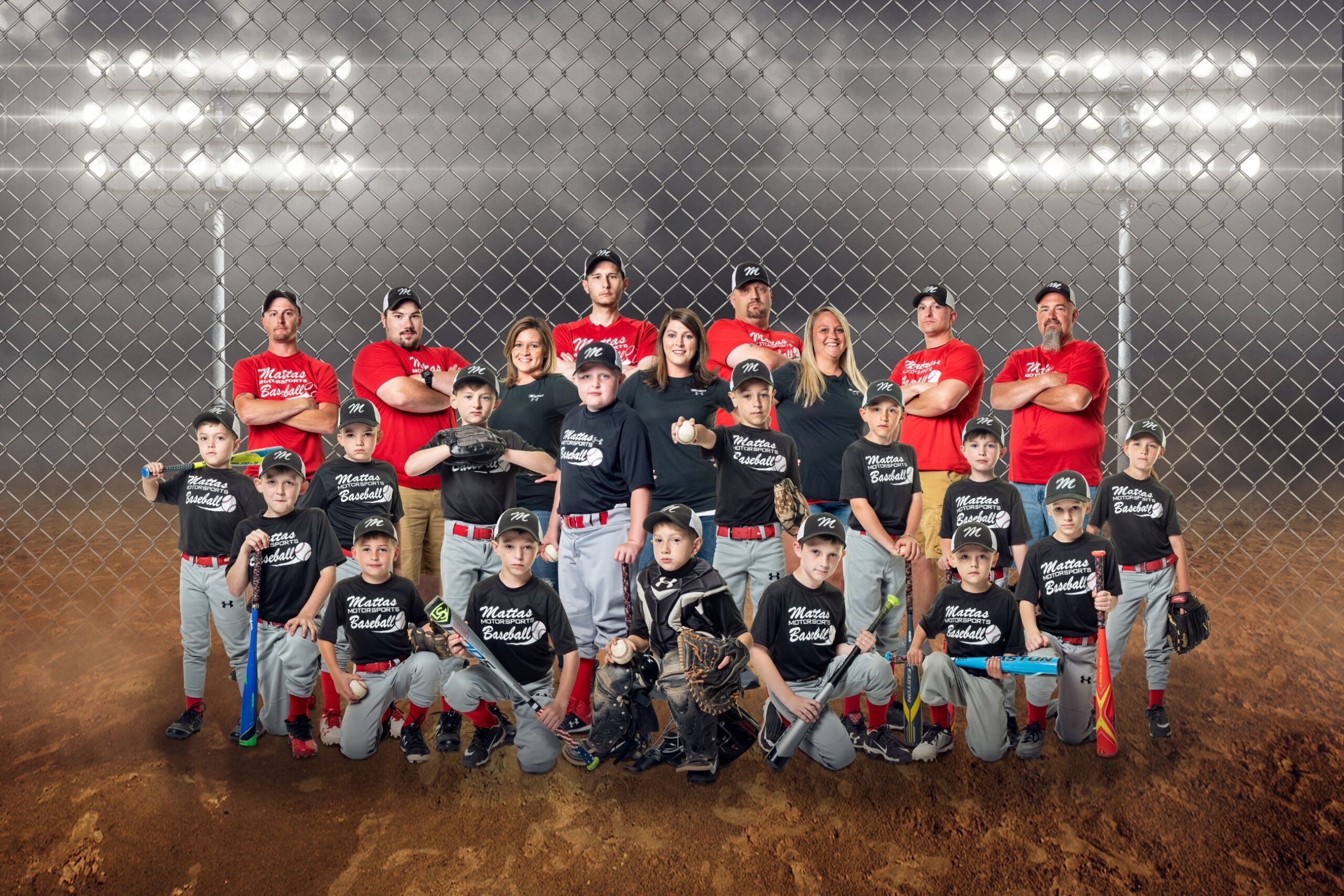 Little league team posing together
