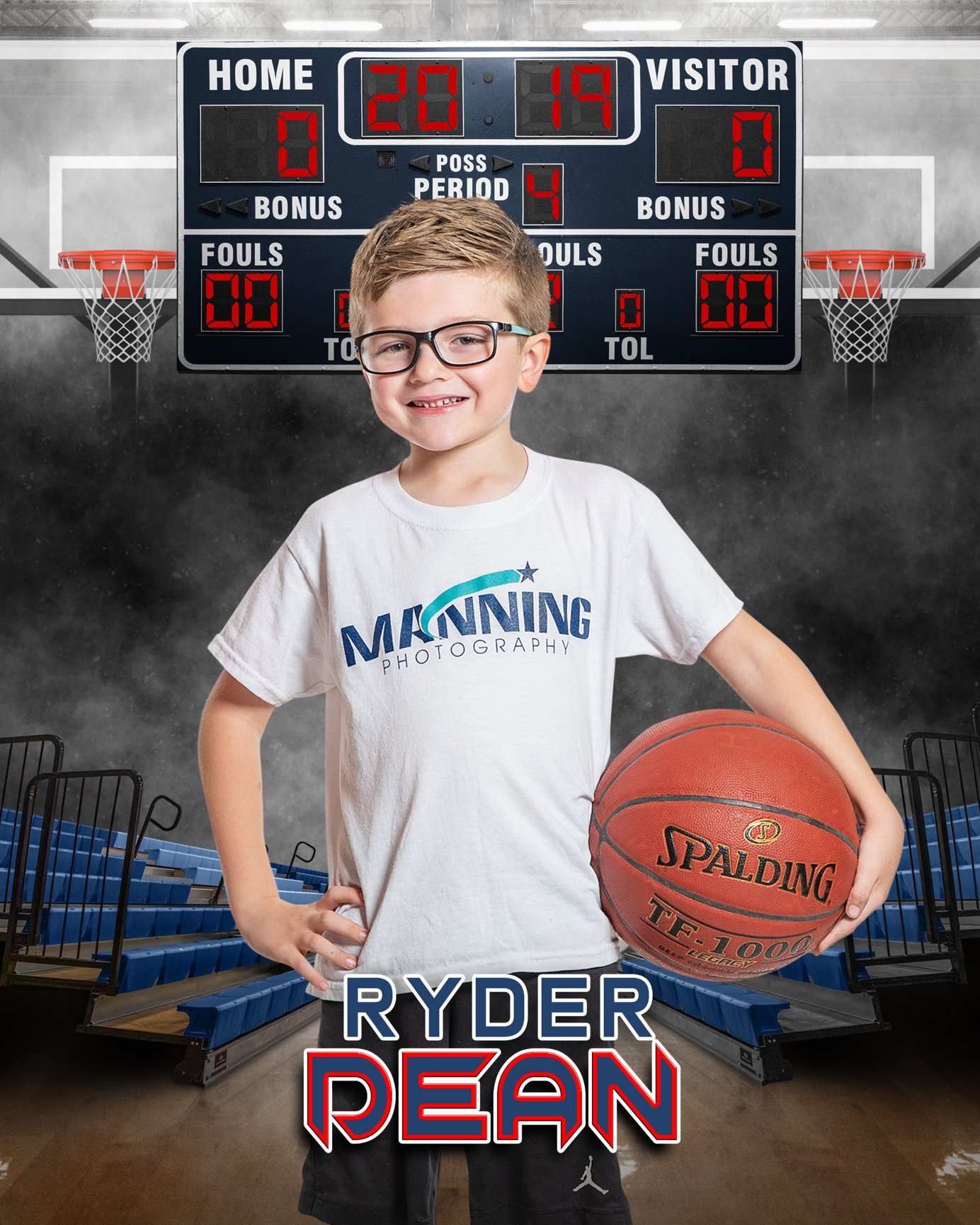 Young boy holding basketball on court