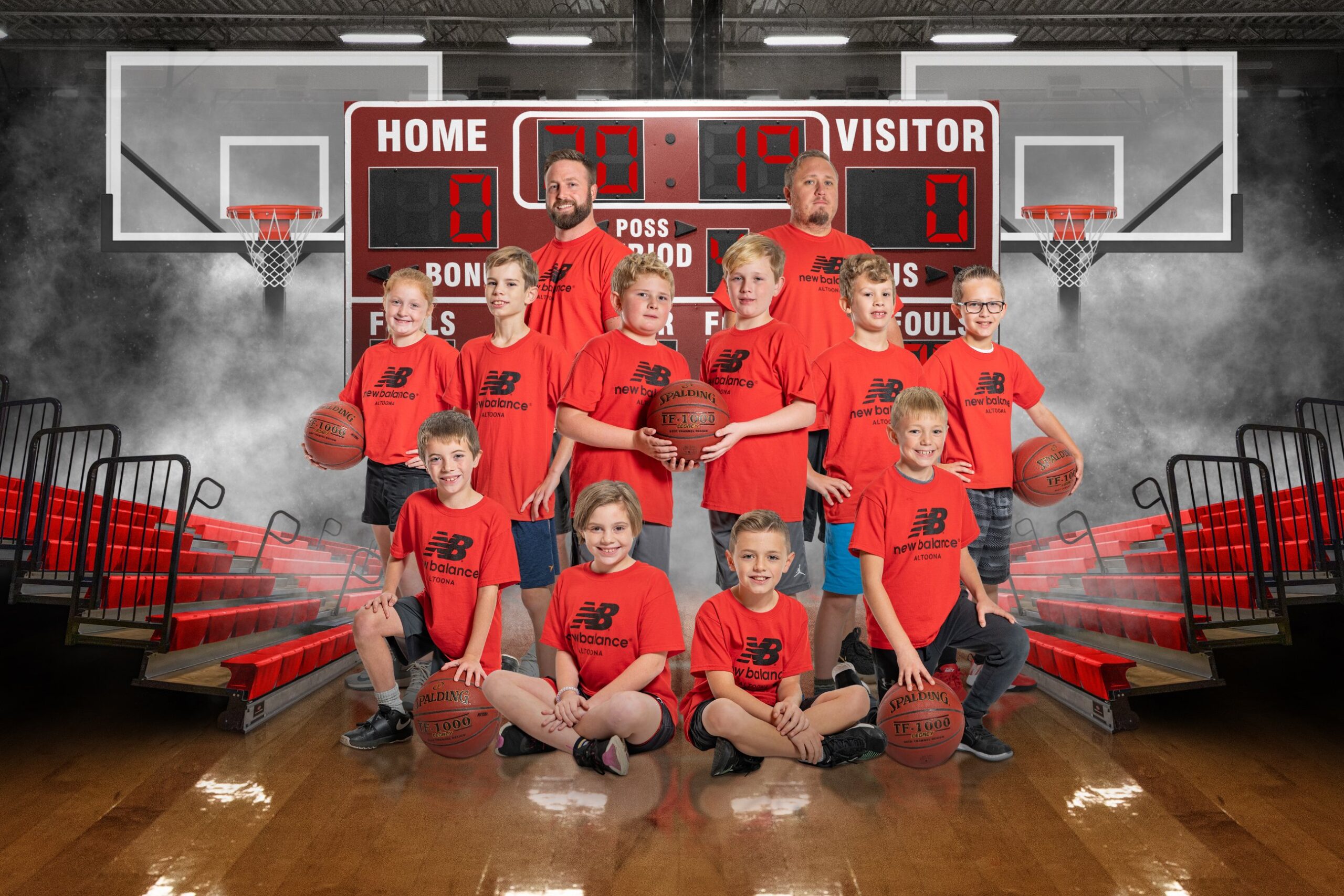 Youth basketball team posing on court