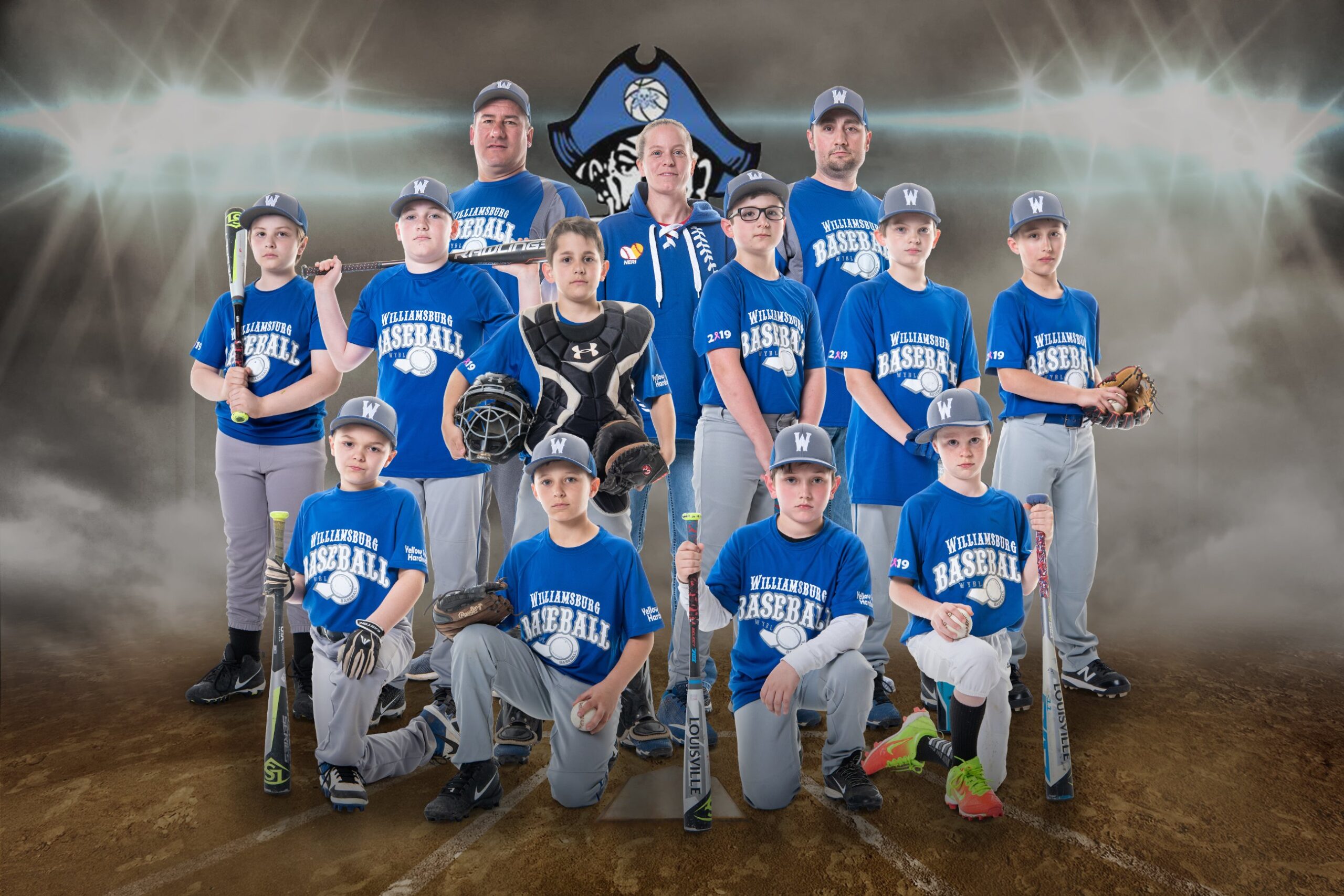 Young athletes in blue jerseys smiling