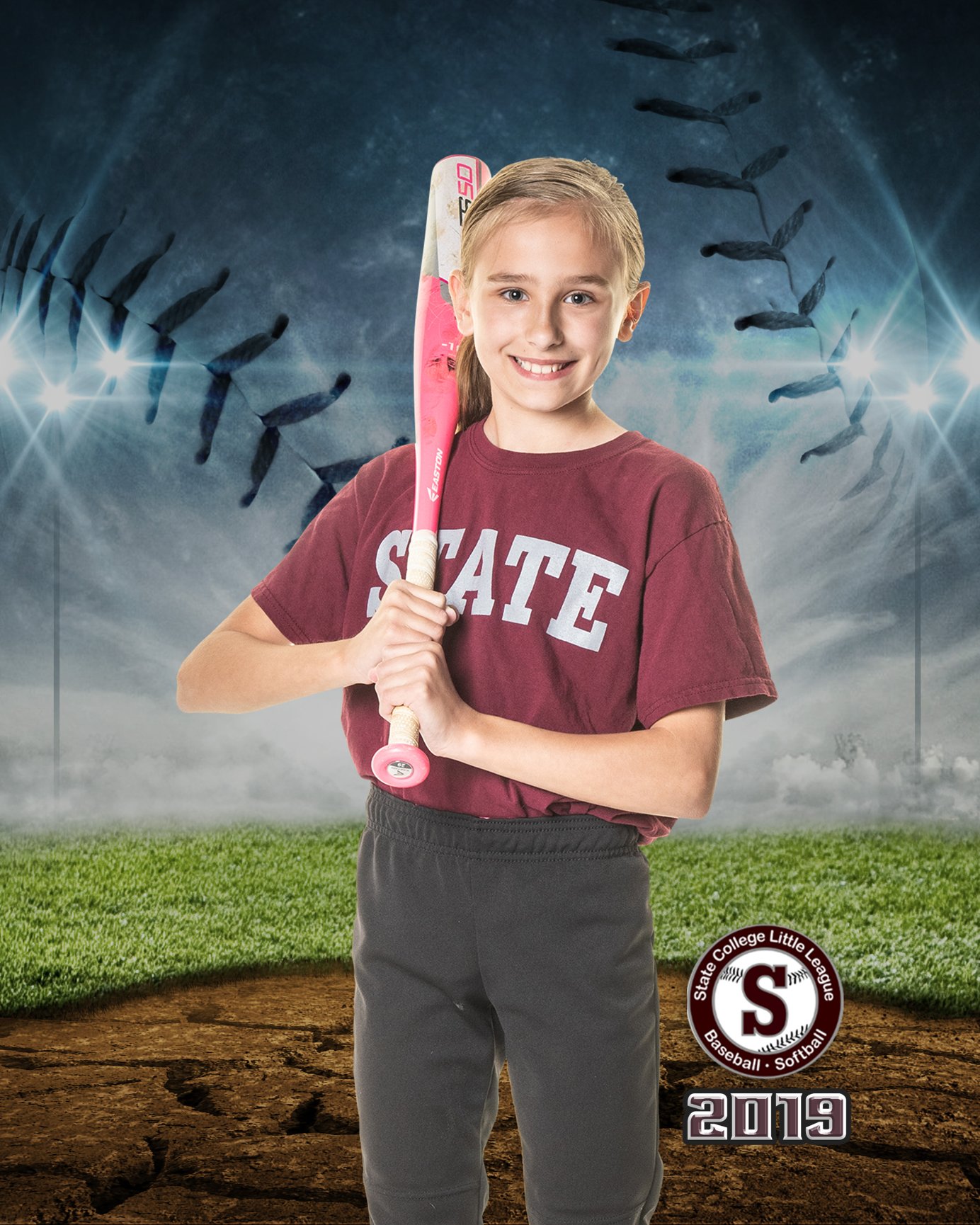 Girl holding pink baseball bat