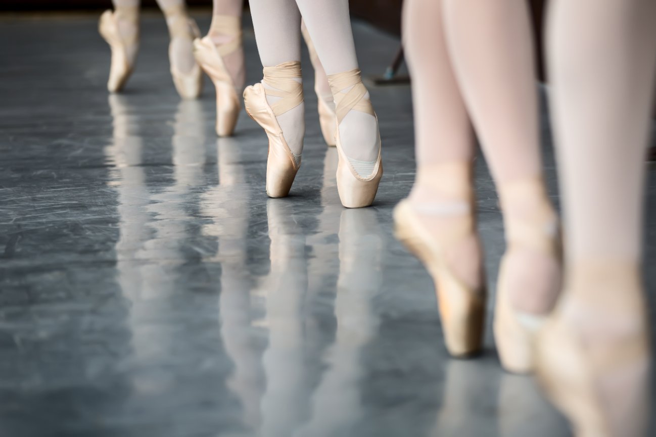 Row of ballet shoes in motion