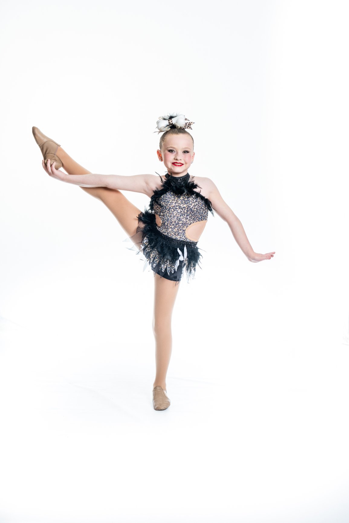Ballet dancer performing high kick