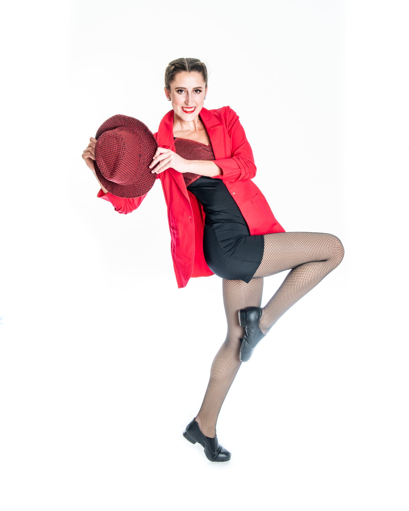 Woman in dance pose, red attire