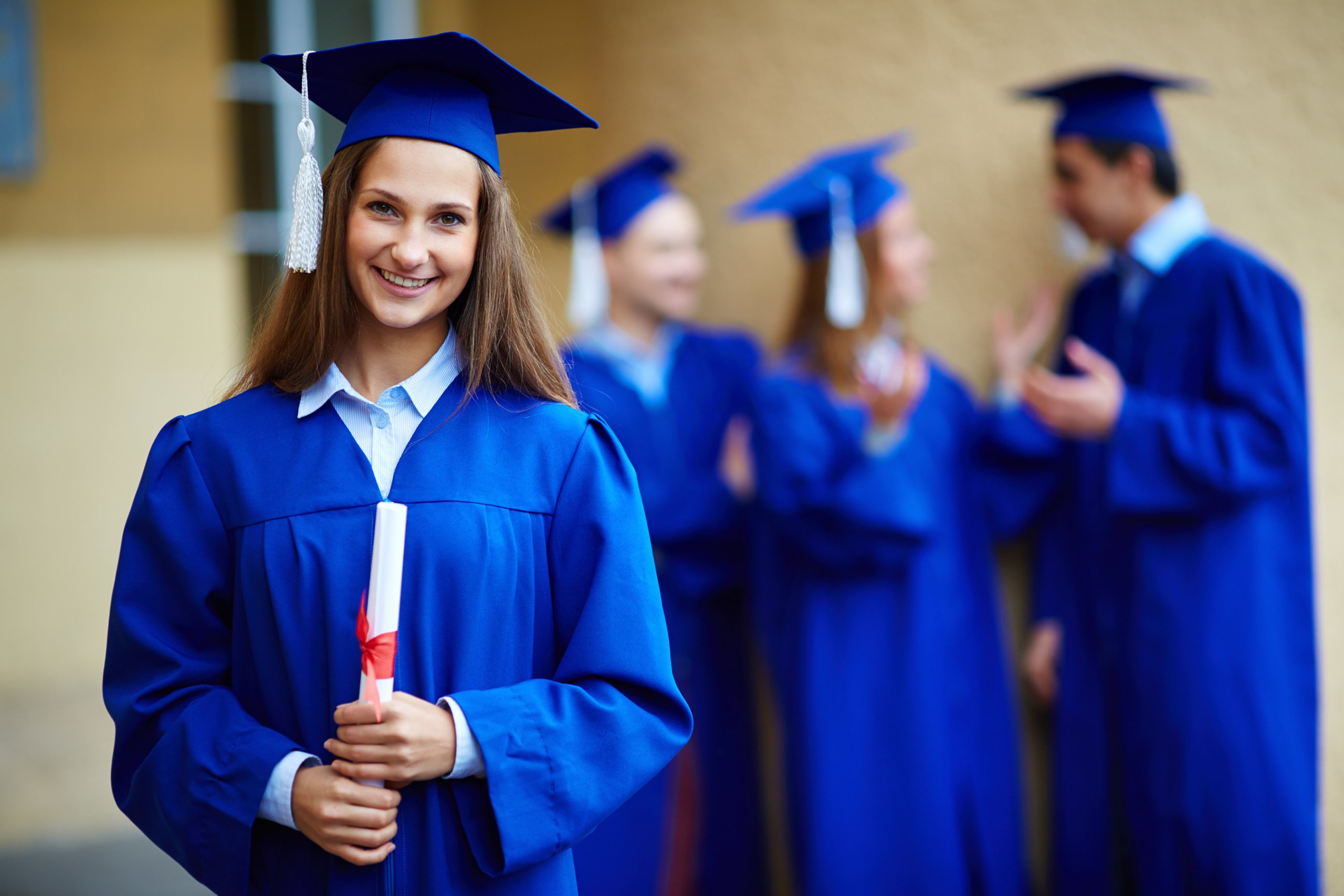 Group of graduates in blue robes