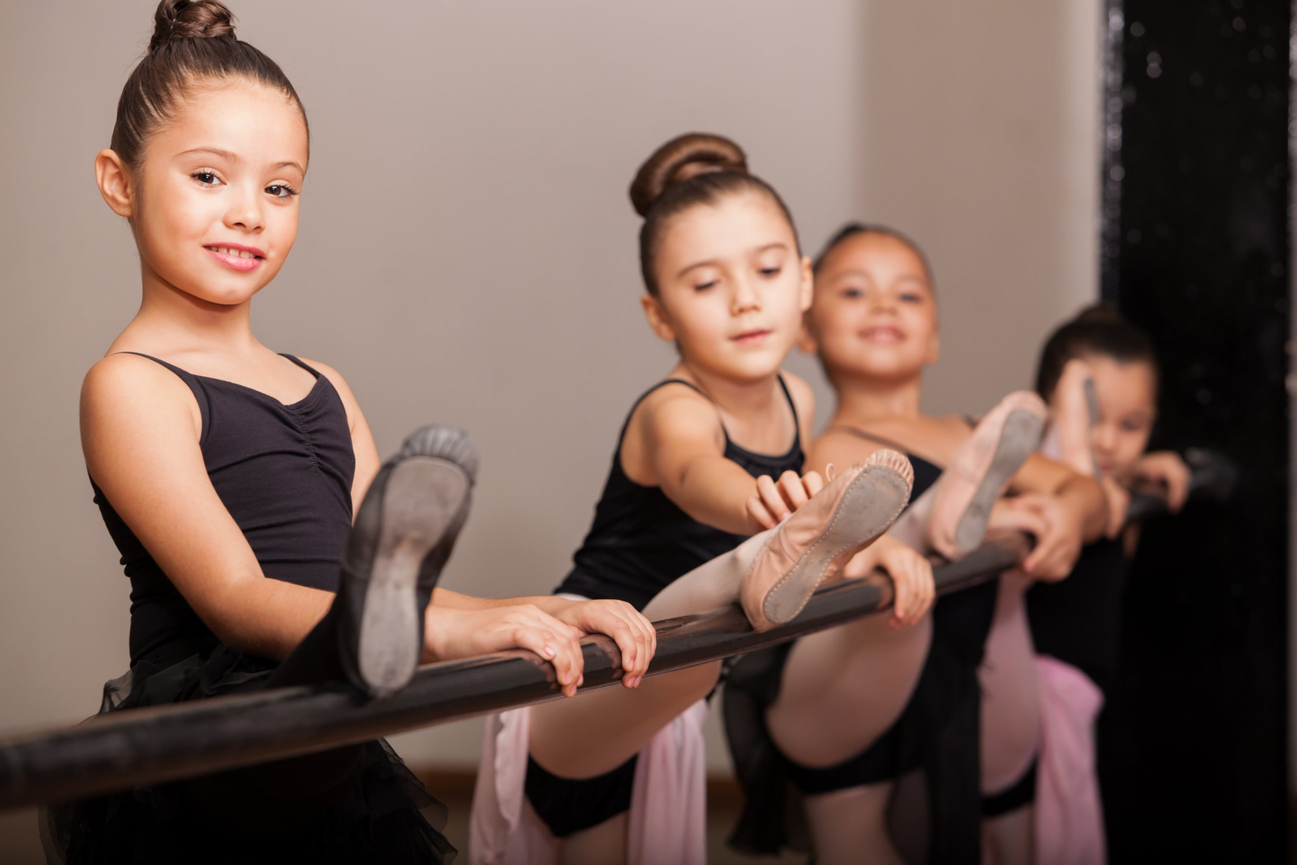 Girls practicing ballet in studio
